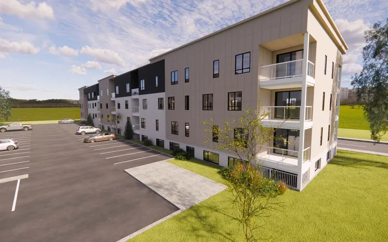 Rendu 3D des immeubles locatifs de la rue Dussault, vus depuis le stationnement